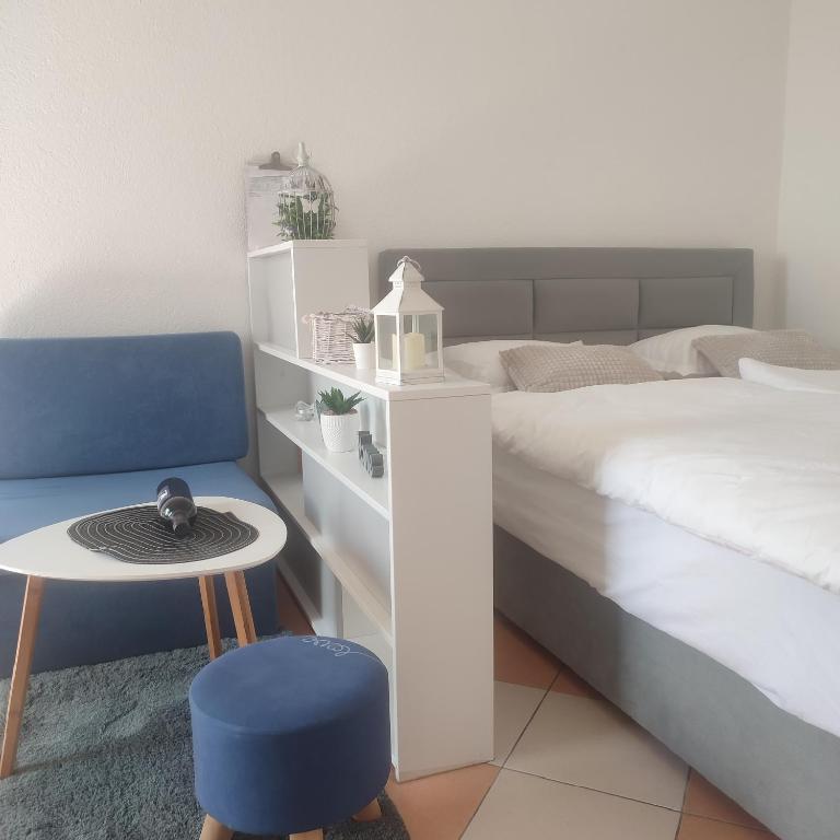 Postel nebo postele na pokoji v ubytování StudioEni