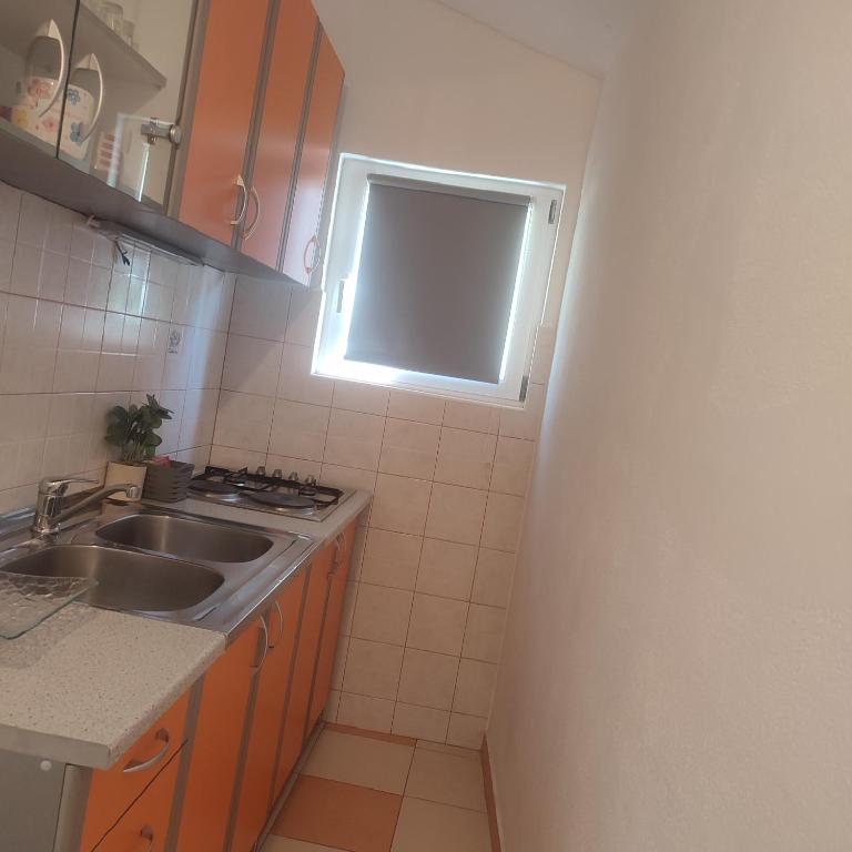 Kuchyň nebo kuchyňský kout v ubytování StudioEni