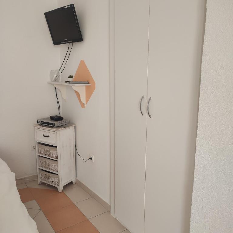 TV a/nebo společenská místnost v ubytování StudioEni