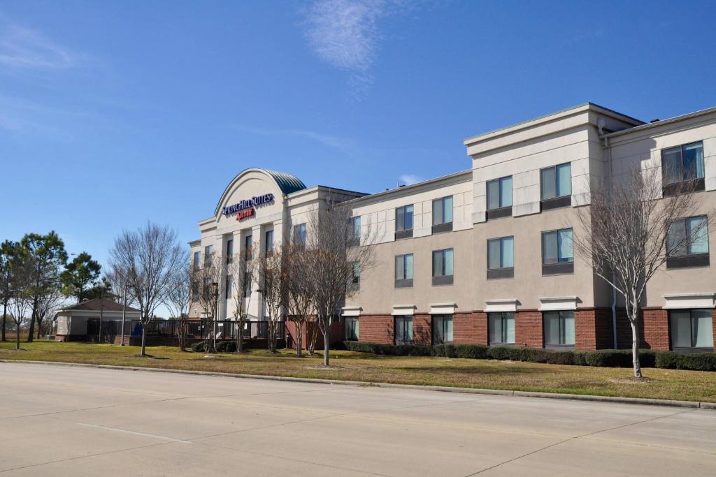 a white building with a dome on top of it at SpringHill Suites Houston Katy Mills in Katy