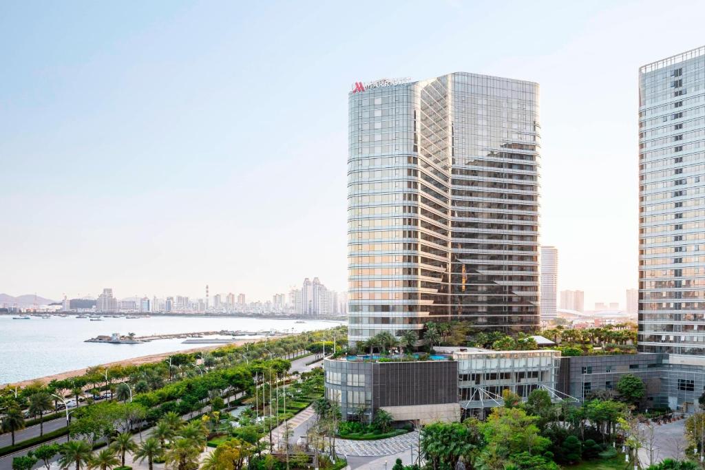 an aerial view of a city with tall buildings at Xiamen Marriott Hotel Haicang in Xiamen