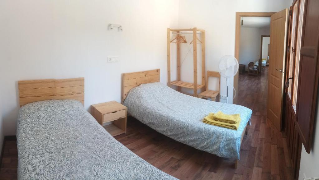 Postel nebo postele na pokoji v ubytování Apartamentos Rurales Rad Icarium