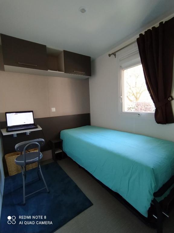 Postel nebo postele na pokoji v ubytování GH Vacances La Réserve