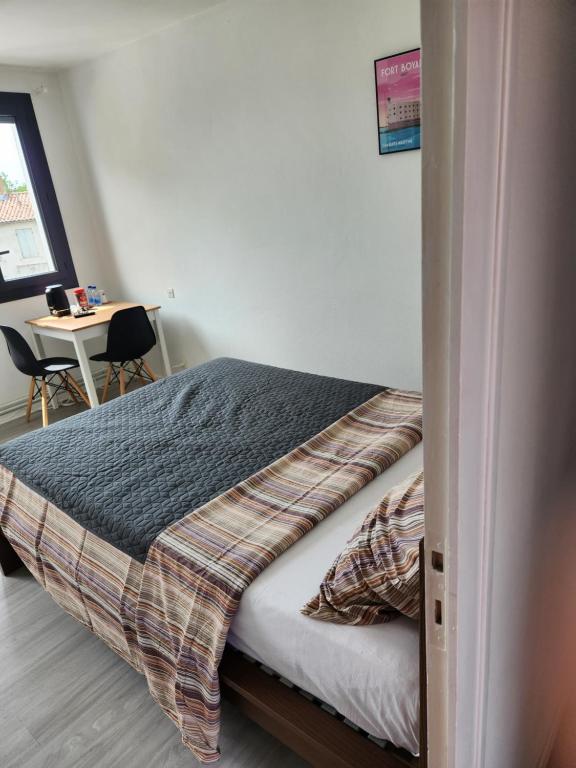 Postel nebo postele na pokoji v ubytování Chambre privée indépendante