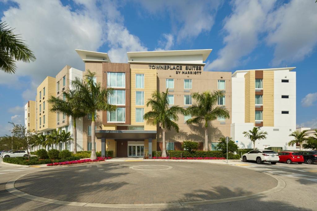 a rendering of a hotel with a parking lot at TownePlace Suites Miami Kendall West in Kendall