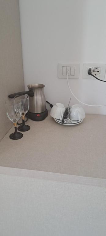 Kuchyň nebo kuchyňský kout v ubytování Hotel Noel