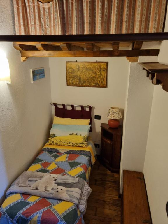 Postel nebo postele na pokoji v ubytování Casetta Giulia