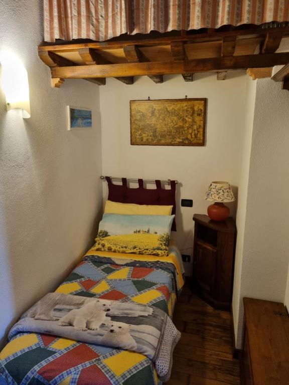 Postel nebo postele na pokoji v ubytování Casetta Giulia