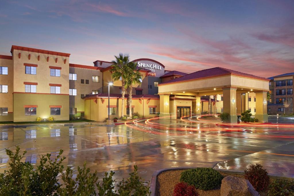 an empty parking lot in front of a hotel at SpringHill Suites Victorville Hesperia in Hesperia