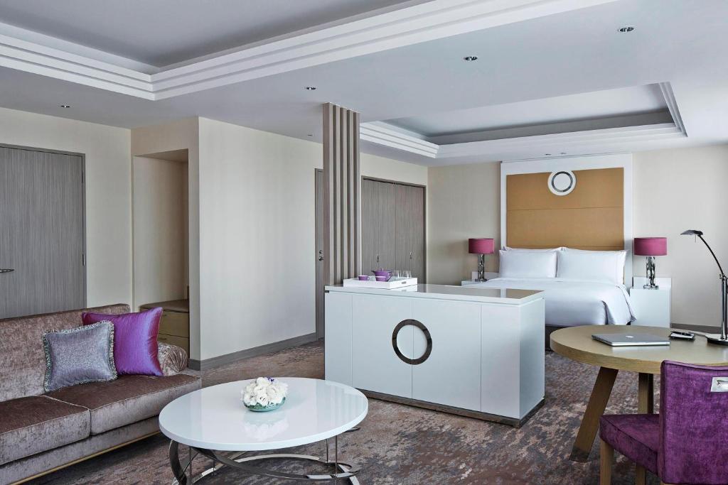 a hotel room with a bed and a couch at Tokyo Marriott Hotel in Tokyo
