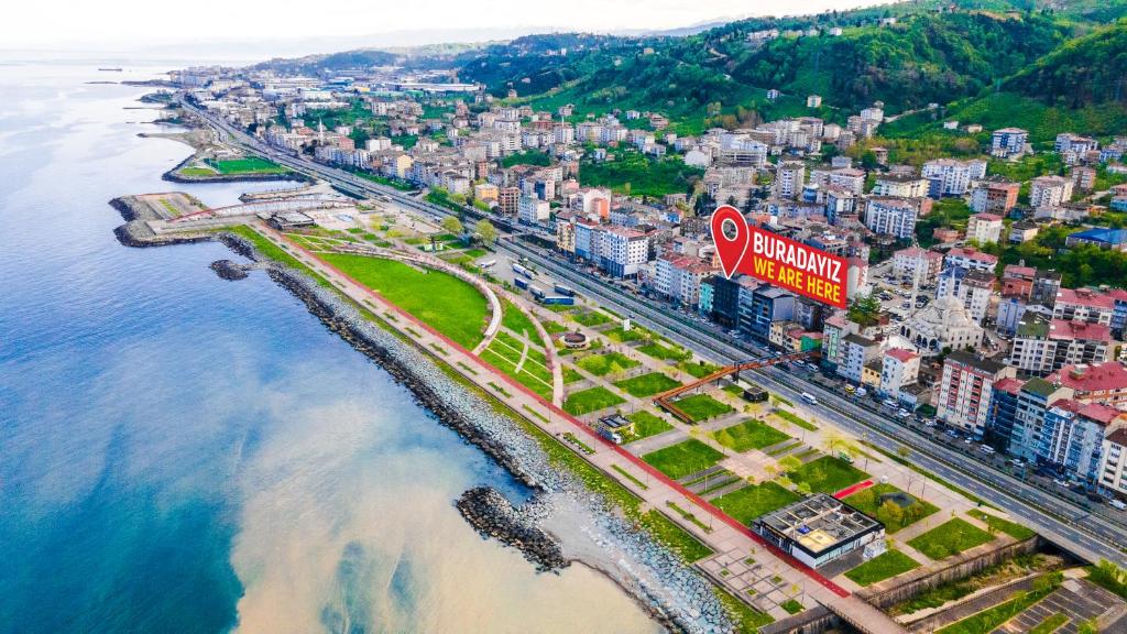 an aerial view of a city next to the ocean at GÜRSOY EXCLUSIVE HOTEL in Trabzon