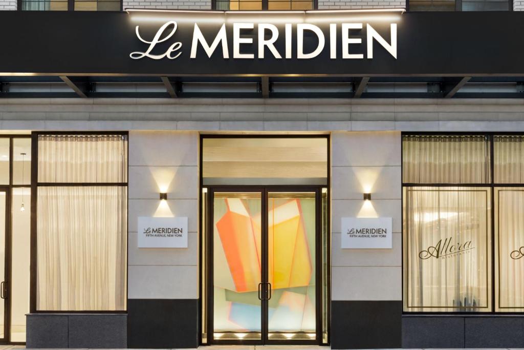 a store front with the entrance to a store at Le Méridien New York, Fifth Avenue in New York