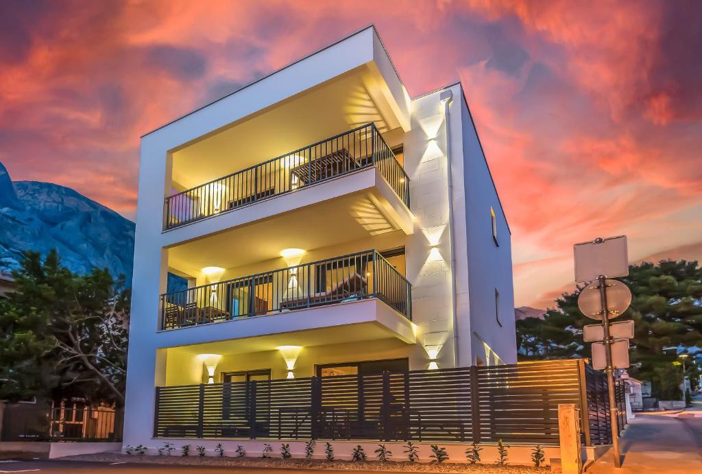 a rendering of a building with a sunset at Luxury Villa Maja in Baška Voda