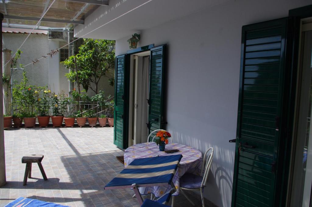 a table and chairs sitting on a patio at Casa Fortunata in Positano