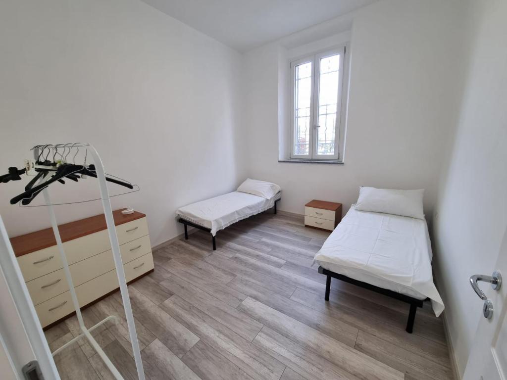 Postel nebo postele na pokoji v ubytování Appartamento viktor