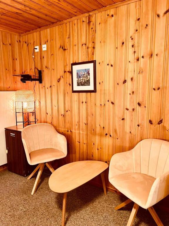 Posezení v ubytování Rooms with Private bathrooms