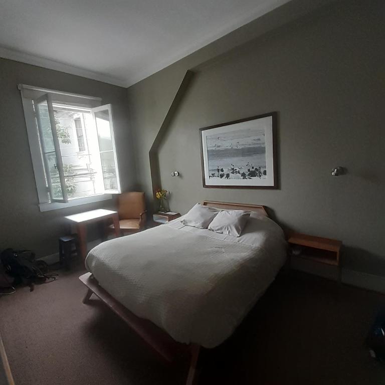 Postel nebo postele na pokoji v ubytování El Navegante B&B