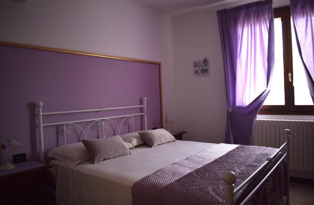 Postel nebo postele na pokoji v ubytování A Casa di Laura