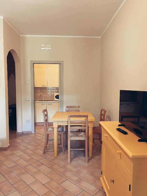 TV a/nebo společenská místnost v ubytování Residenze l'Alberata
