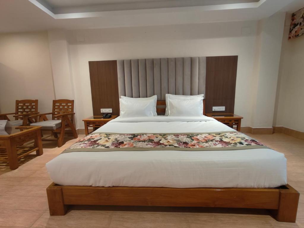 Postel nebo postele na pokoji v ubytování Mount Polaris Suites & Spa