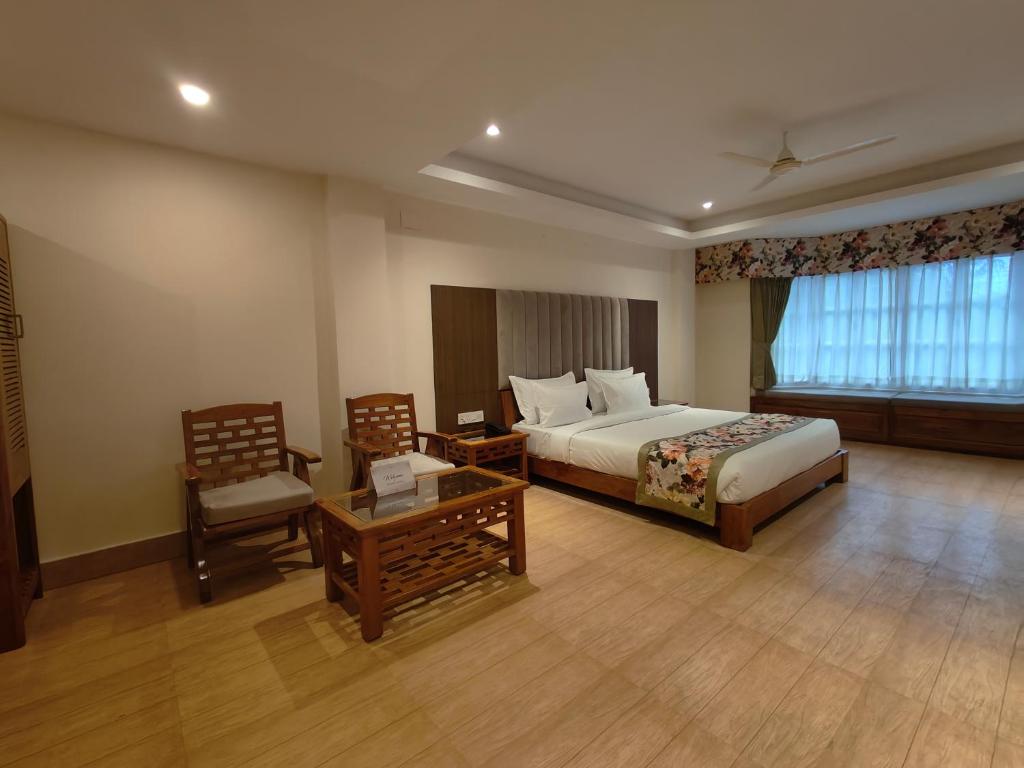 Postel nebo postele na pokoji v ubytování Mount Polaris Suites & Spa