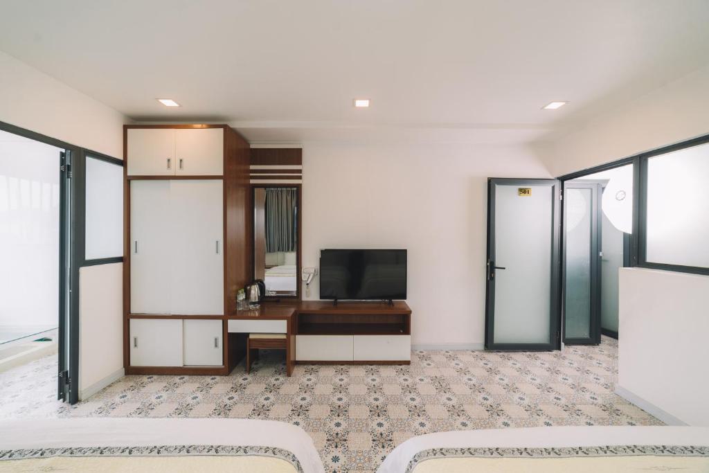 TV/trung tâm giải trí tại Hạ Na Hotel Đà Lạt
