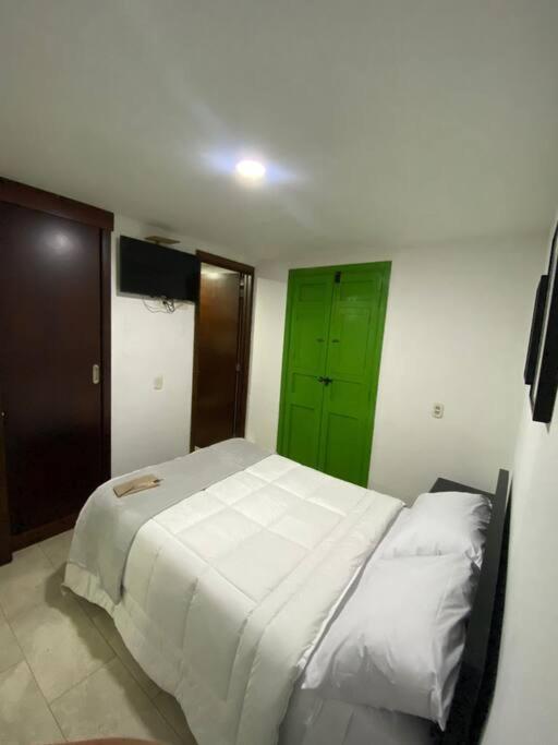 Gulta vai gultas numurā naktsmītnē mountain apartment Salento Quindío