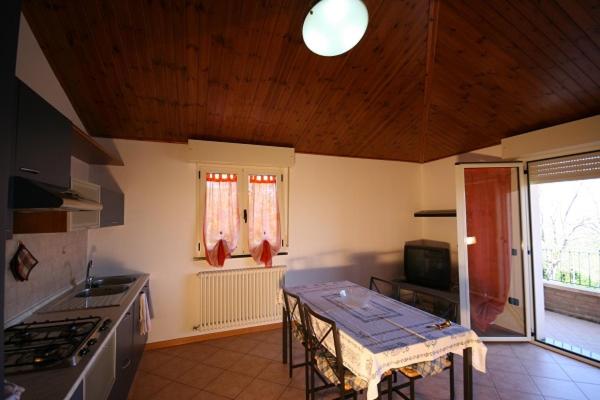 Kuchyň nebo kuchyňský kout v ubytování Albergo Centopini