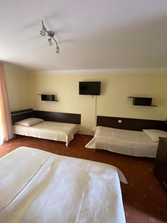 Postel nebo postele na pokoji v ubytování OW Posejdon