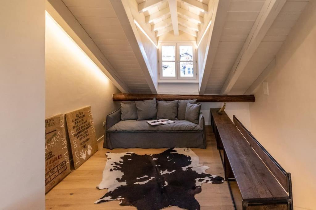 a living room with a couch and a table at CRoix 1541 - CIR 0198 in Aosta