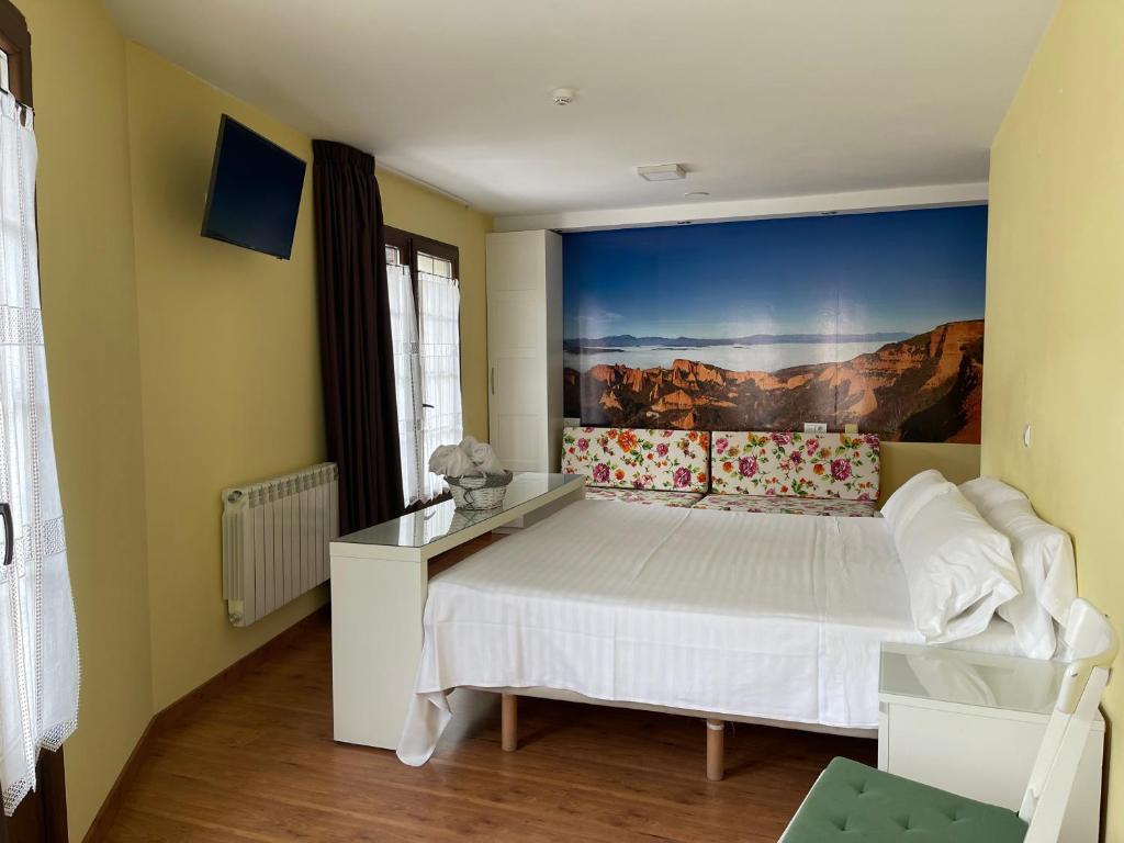 Postel nebo postele na pokoji v ubytování The Way Hotel Molinaseca