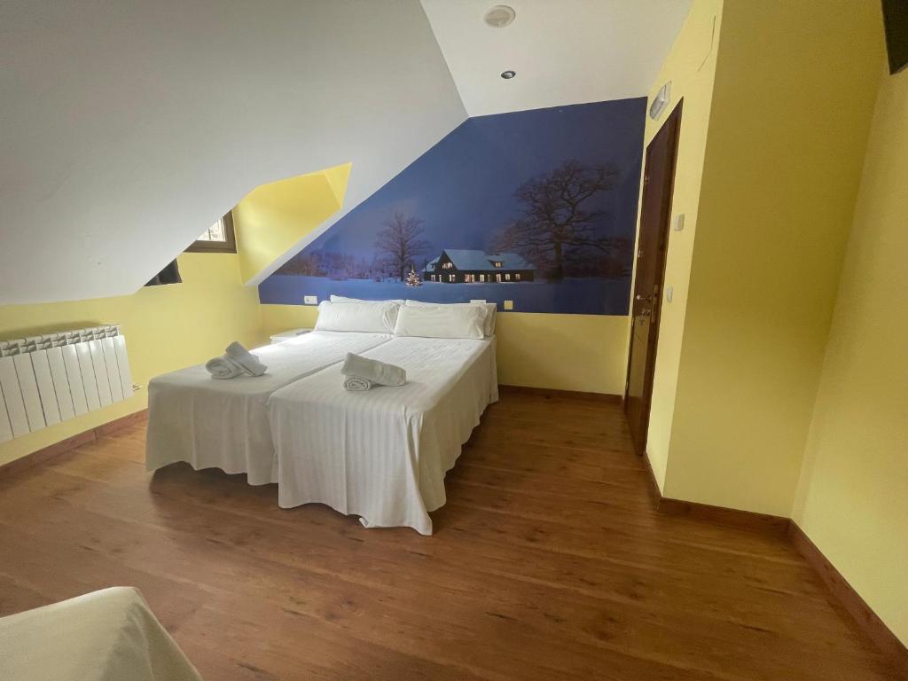 Postel nebo postele na pokoji v ubytování The Way Hotel Molinaseca