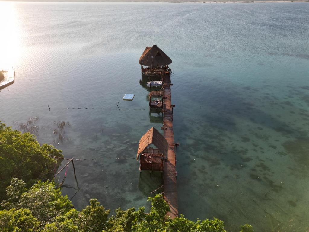 an aerial view of a dock in the water at Hotel Boutique Aurea in Bacalar