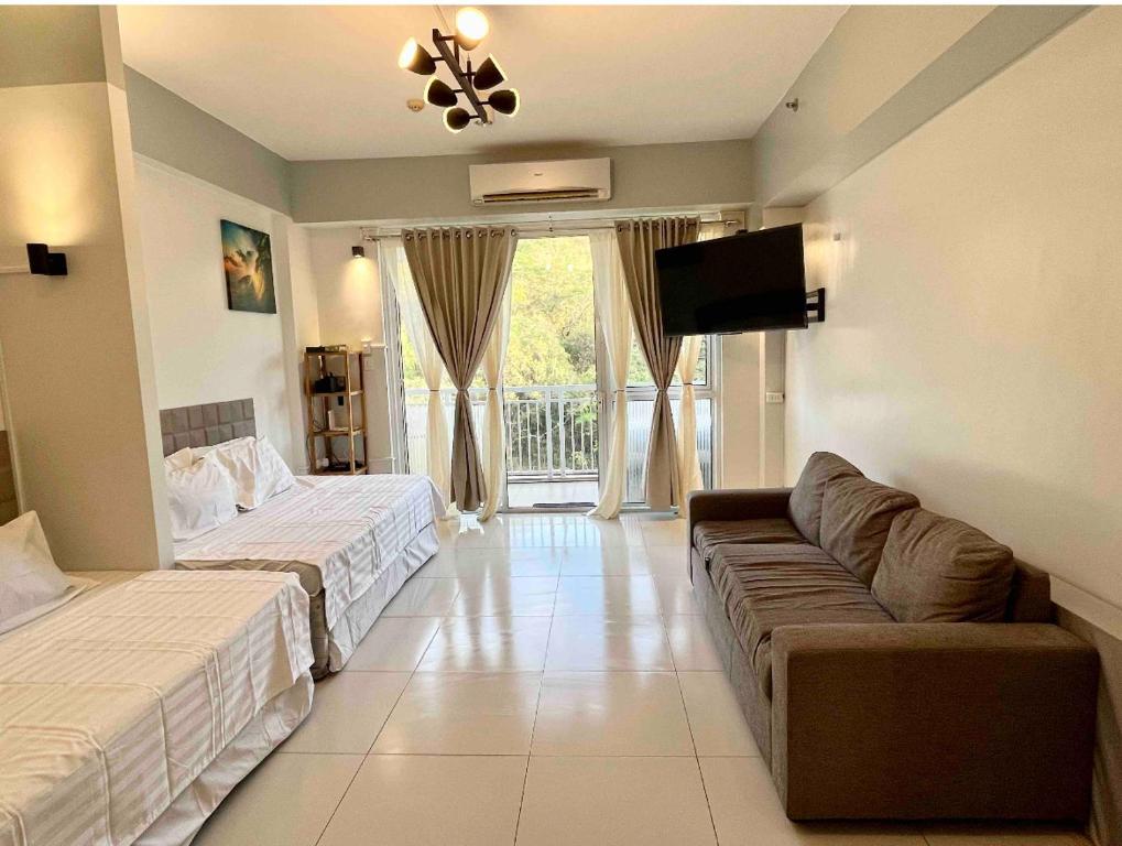 Postel nebo postele na pokoji v ubytování Pico de Loro Miranda Family Beach Condo max 6 pax with fiber internet