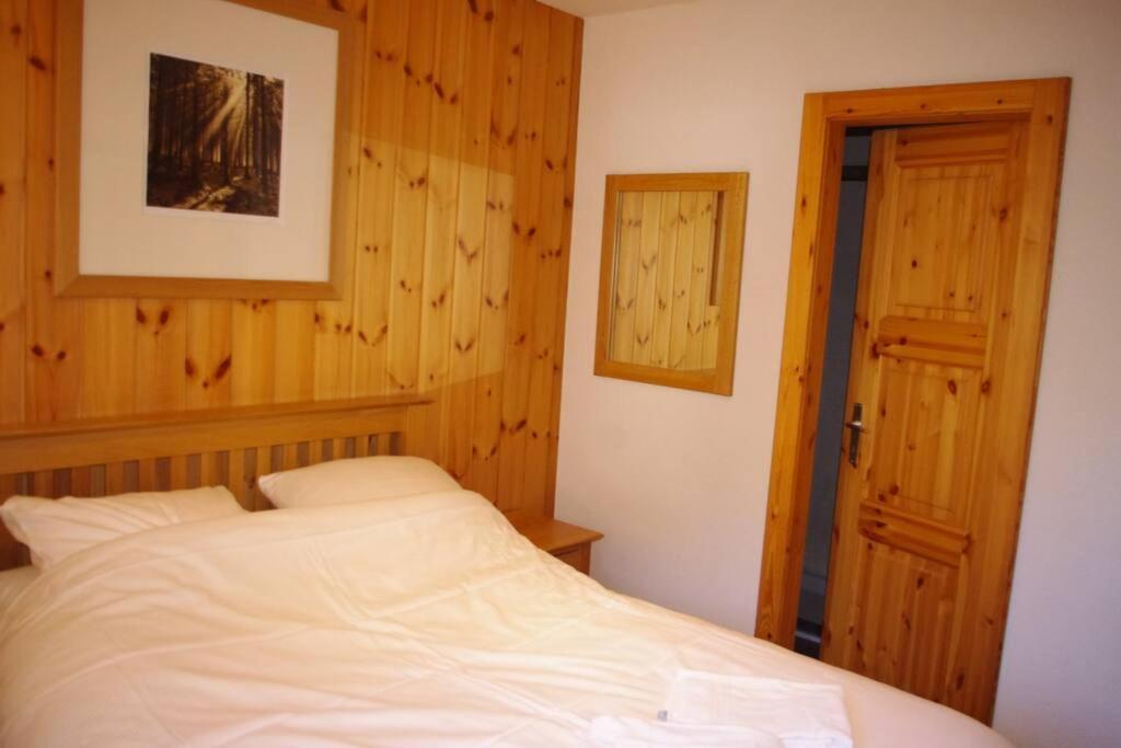 Postel nebo postele na pokoji v ubytování Chalet Mille Étoiles