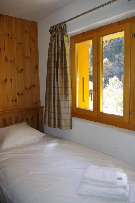 Postel nebo postele na pokoji v ubytování Chalet Mille Étoiles