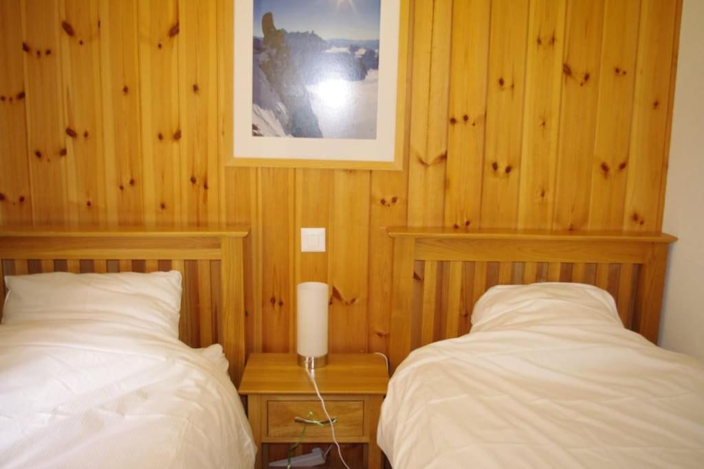 Postel nebo postele na pokoji v ubytování Chalet Mille Étoiles
