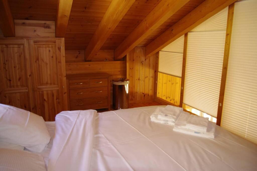Postel nebo postele na pokoji v ubytování Chalet Mille Étoiles