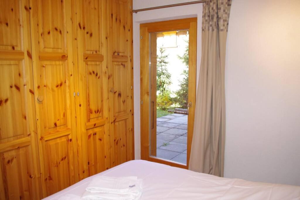 Postel nebo postele na pokoji v ubytování Chalet Mille Étoiles