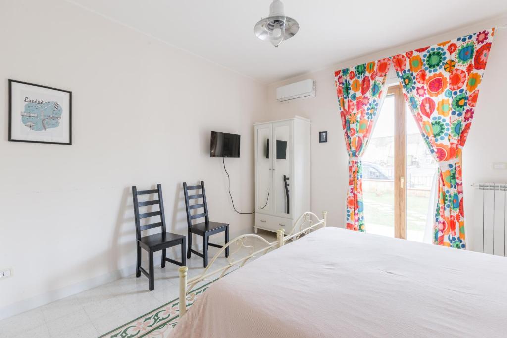 Postel nebo postele na pokoji v ubytování B&B Vigna del Duca