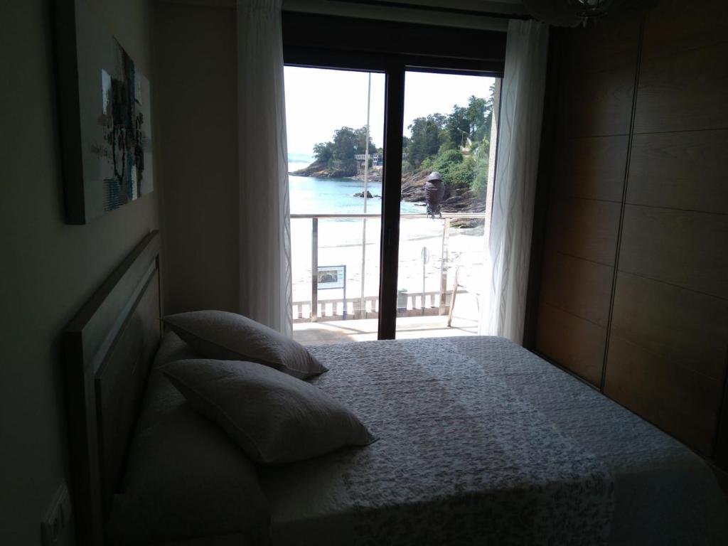 Posteľ alebo postele v izbe v ubytovaní Apartamentos A Bota