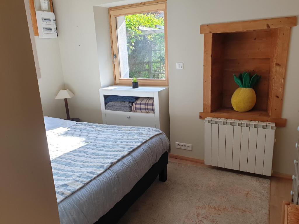 Postel nebo postele na pokoji v ubytování Le Chalet du BioT