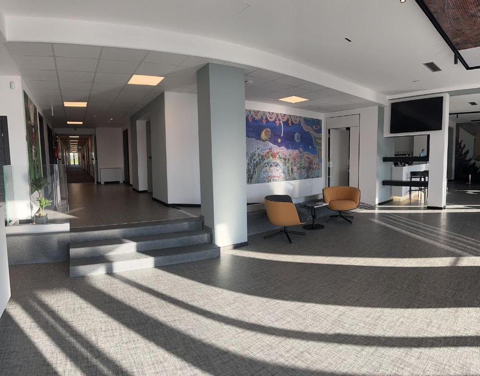 TV a/nebo společenská místnost v ubytování HOTEL MOSAICO