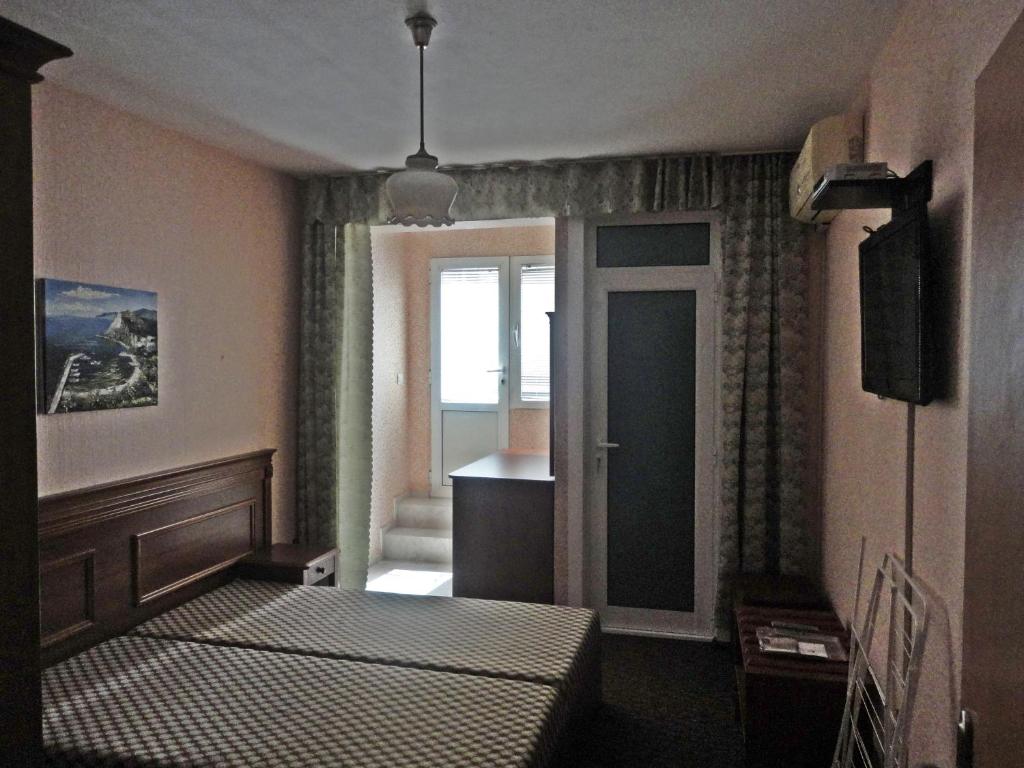 Ліжко або ліжка в номері Guest Rooms Casa Luba
