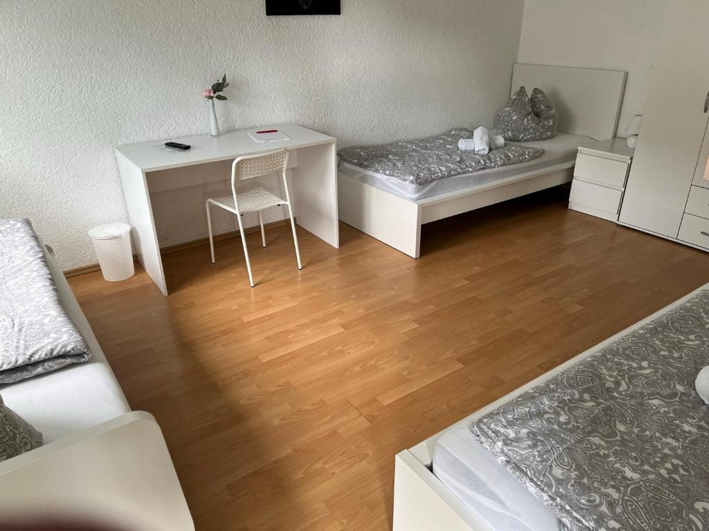 Postel nebo postele na pokoji v ubytování Pension Platzhirsch