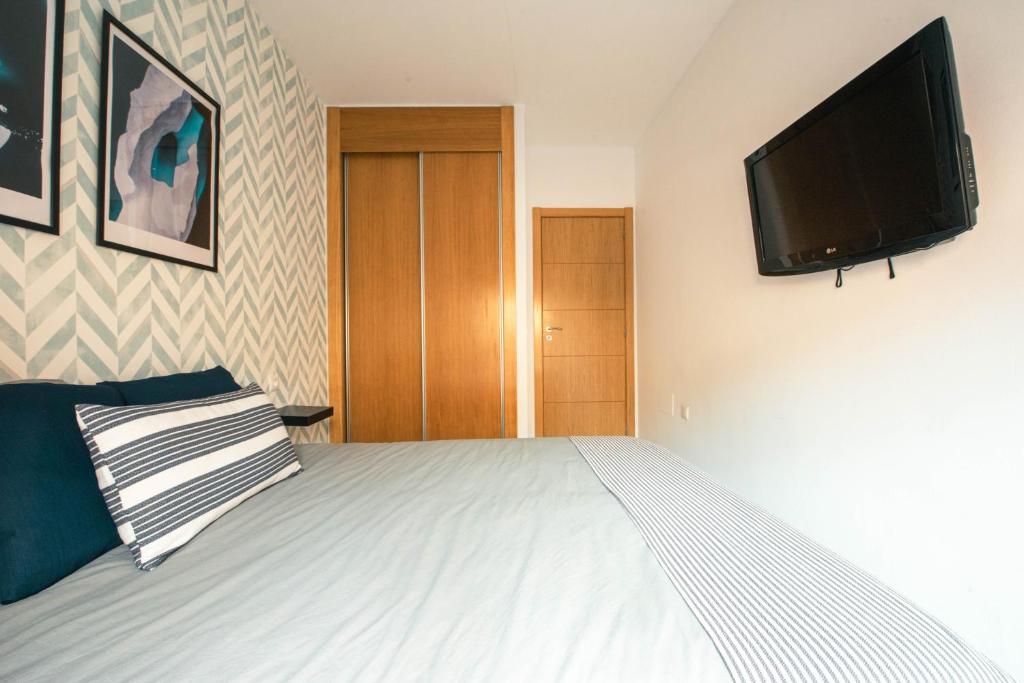 Televízia a/alebo spoločenská miestnosť v ubytovaní Nordik Rooms Village - Chilches "Taby"