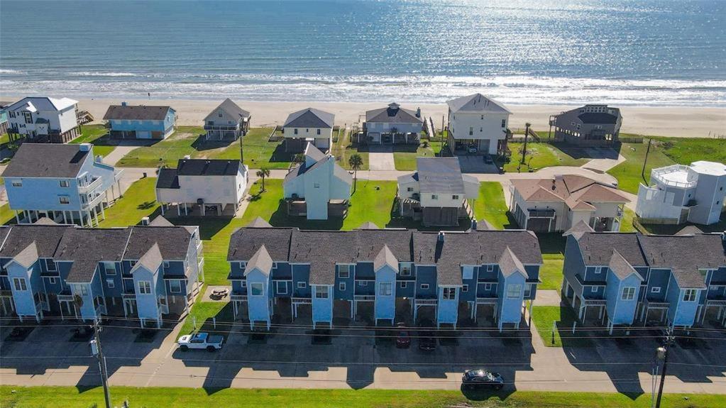 an aerial view of a house near the beach at Hot Tub - Ocean Views - Steps to Private Beach - Quiet Location in Galveston