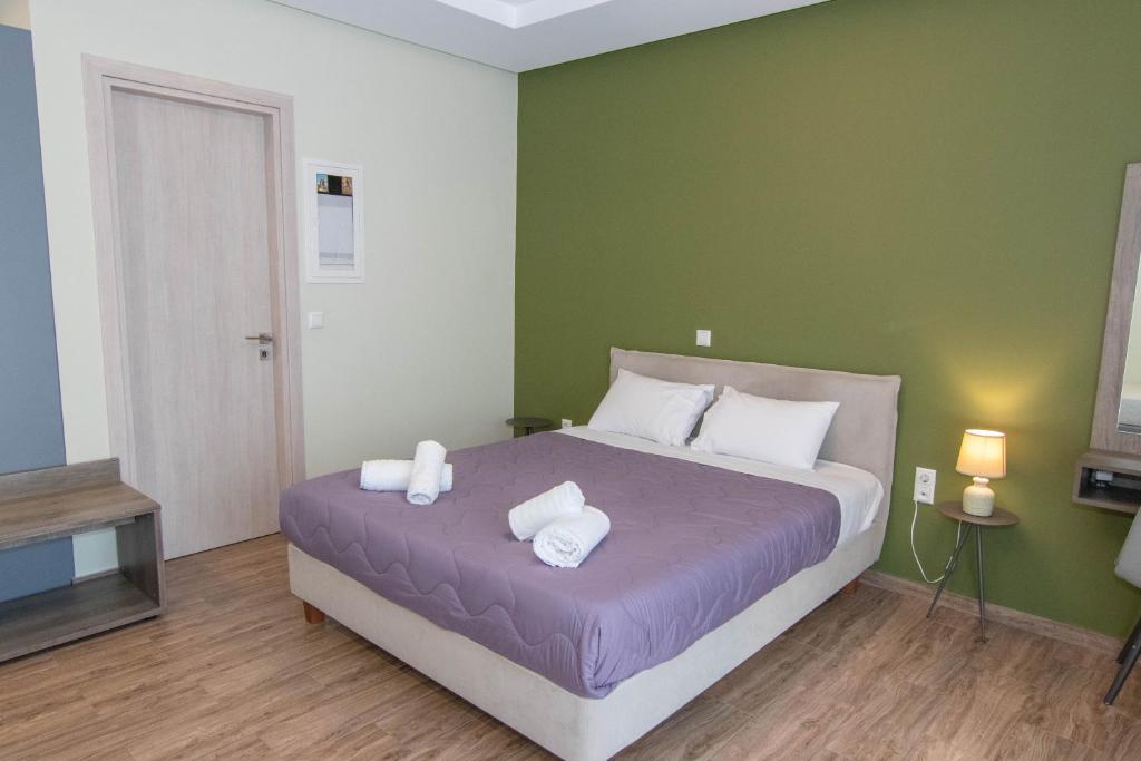 Posteľ alebo postele v izbe v ubytovaní Verga's Apartments