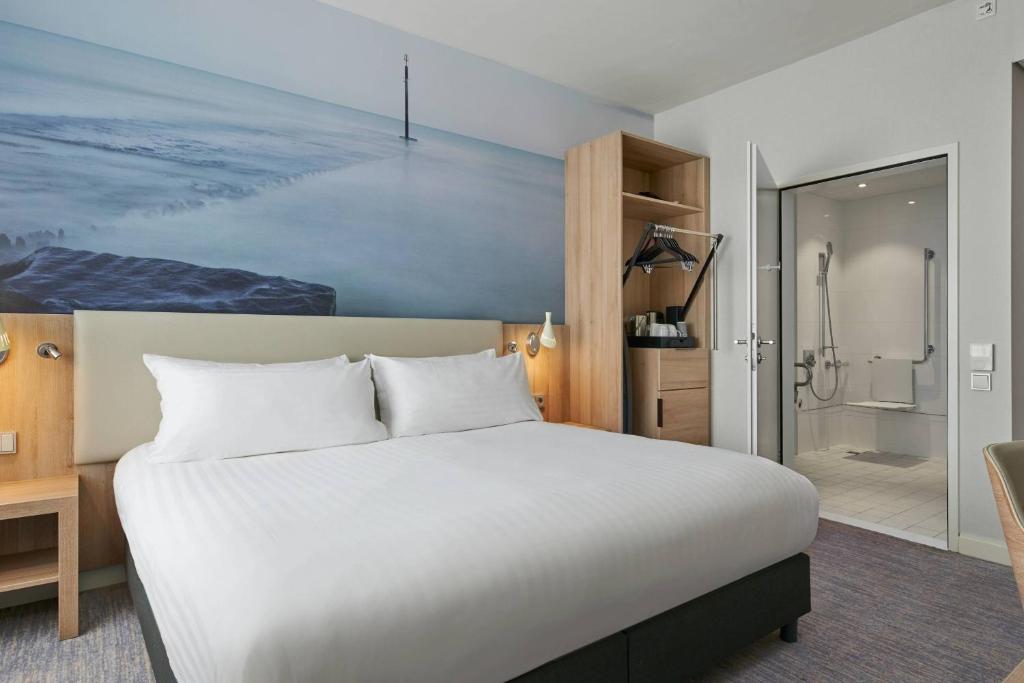 Una cama o camas en una habitación de Marriott Hotel The Hague