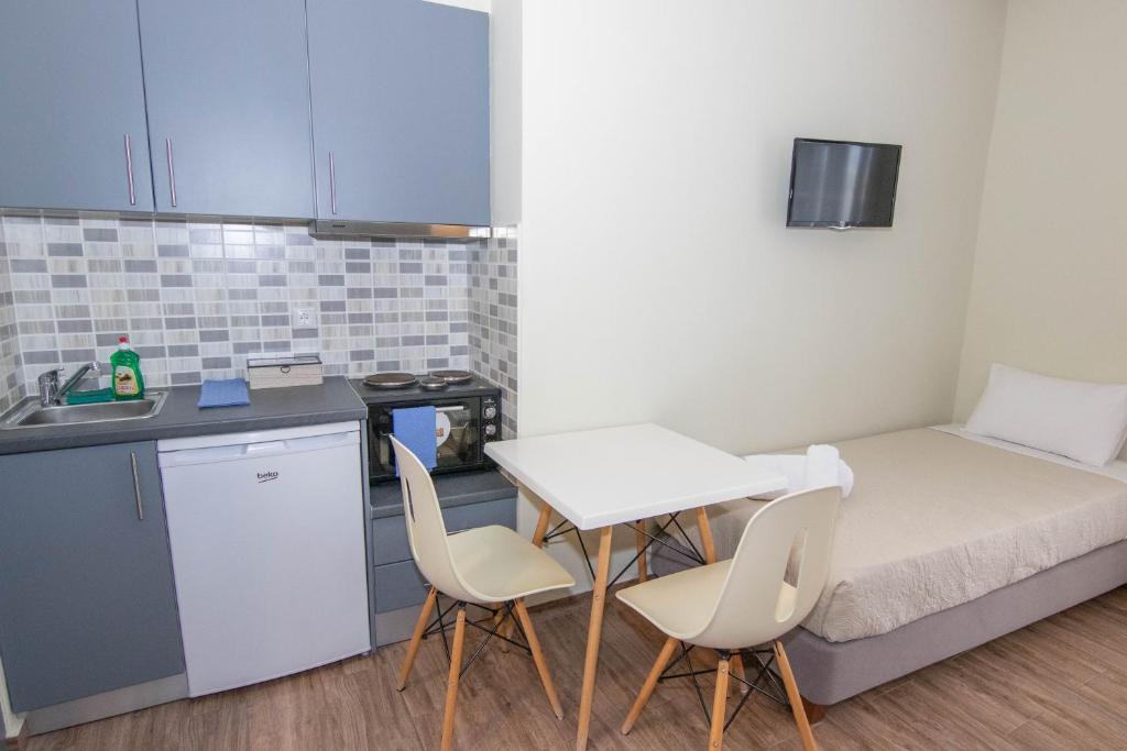 Kuchyňa alebo kuchynka v ubytovaní Verga's Apartments